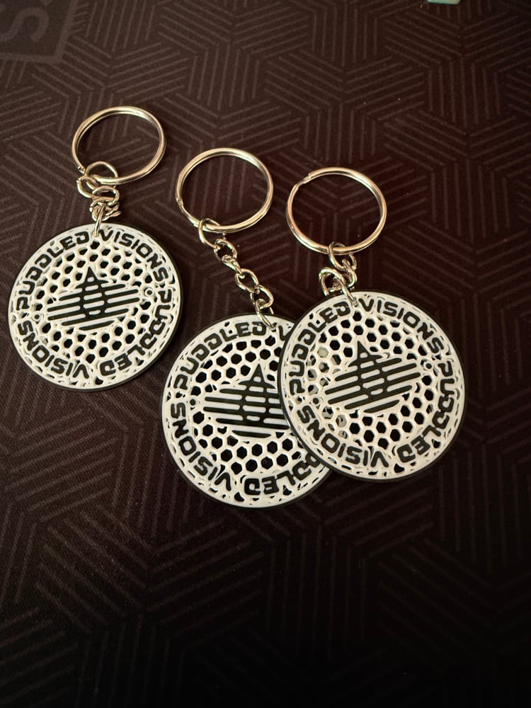 Puddled Visions Flexible Keychain